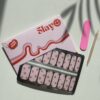 Starstruck, nagel stickers in een roze kleur met gouden sterretjes.