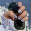 Icy illusion Icy illusion de perfecte blauwe nagels. mooie lichtblauwe kleur met glitters